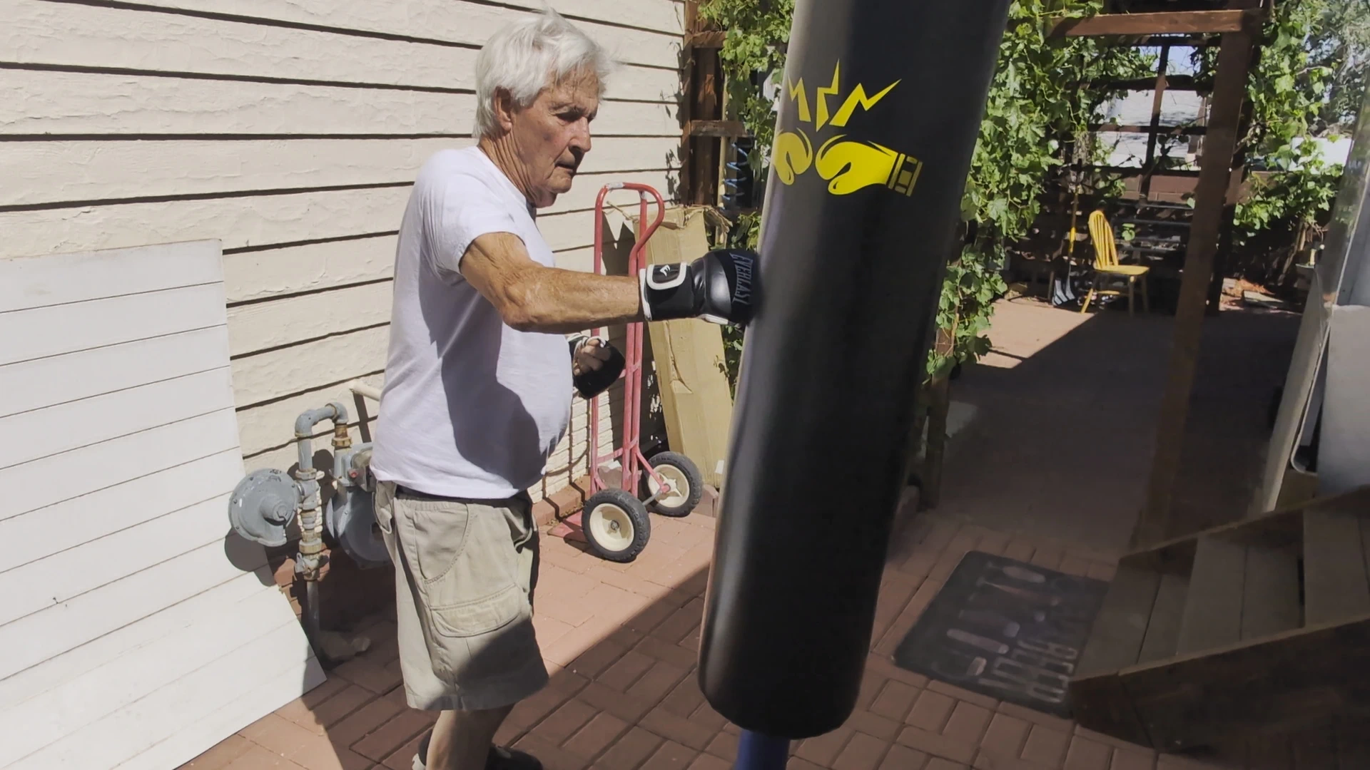 Lex’s 88-year-old father on the heavy bag