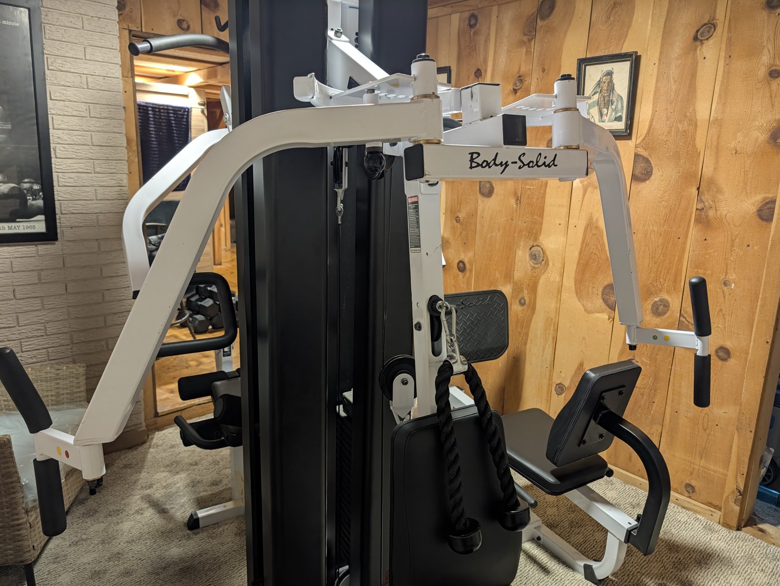 Body-Solid pec deck and cable rope station in Lex and his dad’s home gym