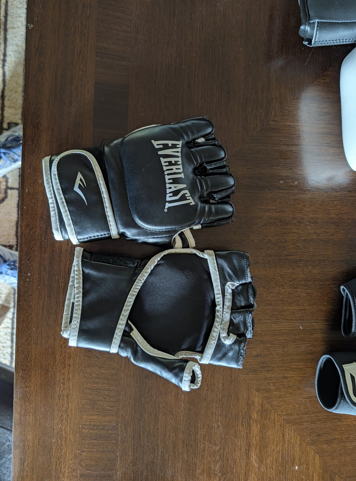 Everlast fingerless MMA gloves Lex compared in heavy bag testing