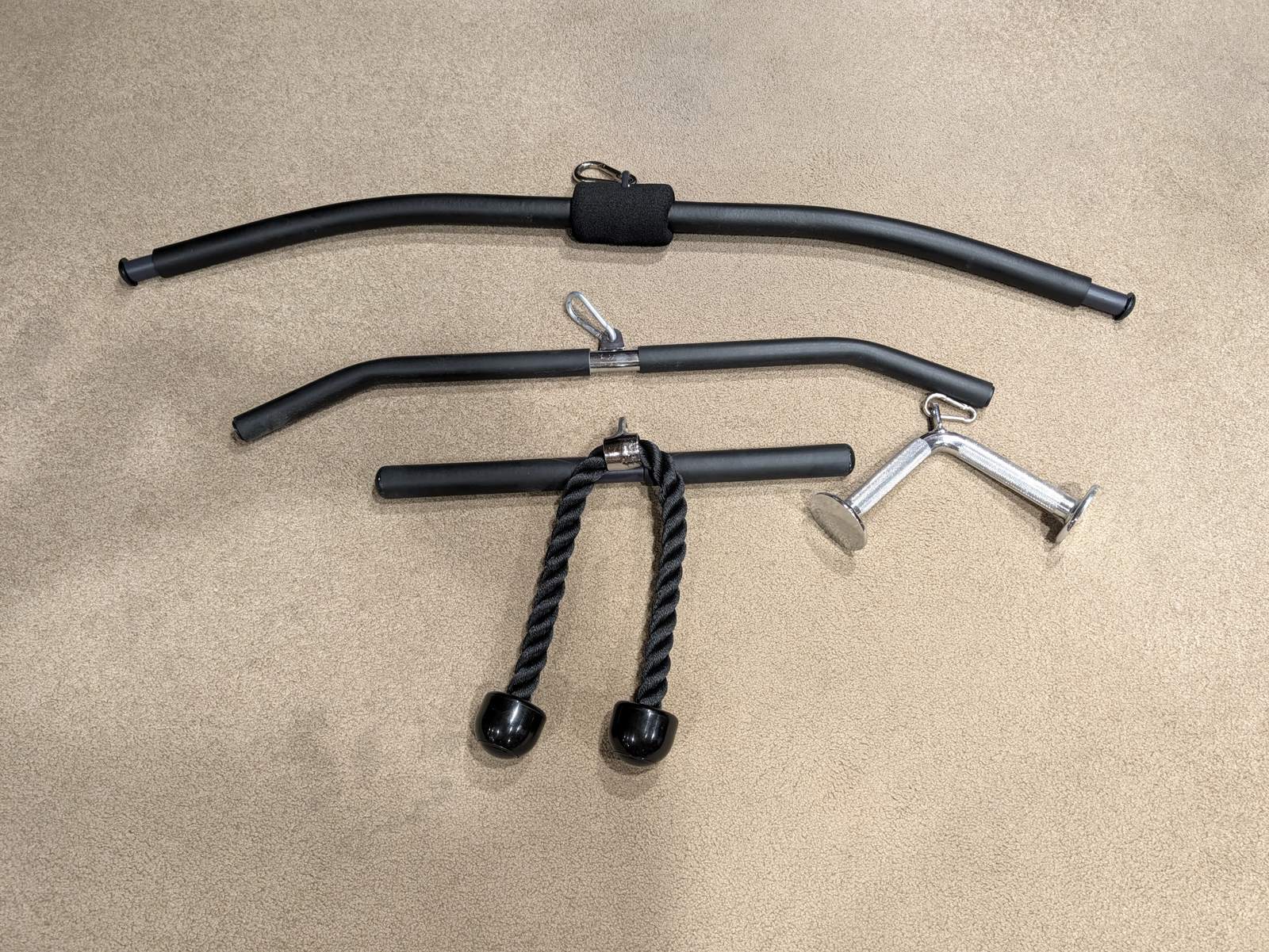 Cable attachments and 48-inch lat bar Lex uses for hanging